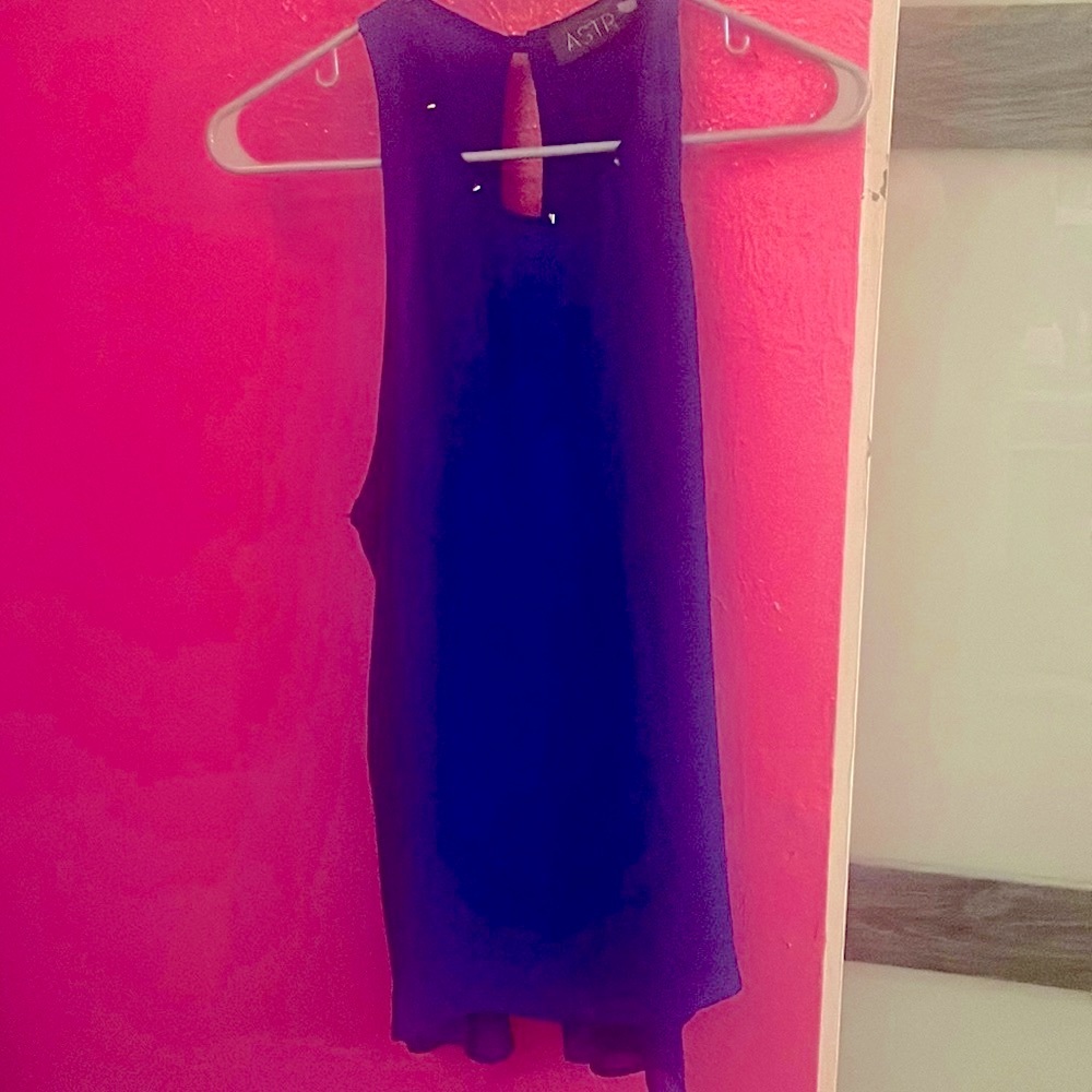 Royal blue sleeveless blouse with gold studs around the neck, Size M